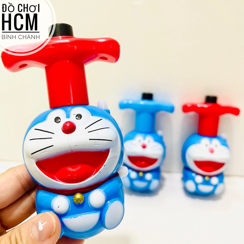 Đồ chơi trẻ em cù quay phát sáng hình Doremon cót xoay cực đẹp dành cho bé thích chơi con quay, con xoay