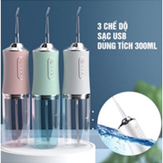 Máy tăm nước vệ sinh răng miệng oral irrigato sạc usb - tặng 4 đầu
