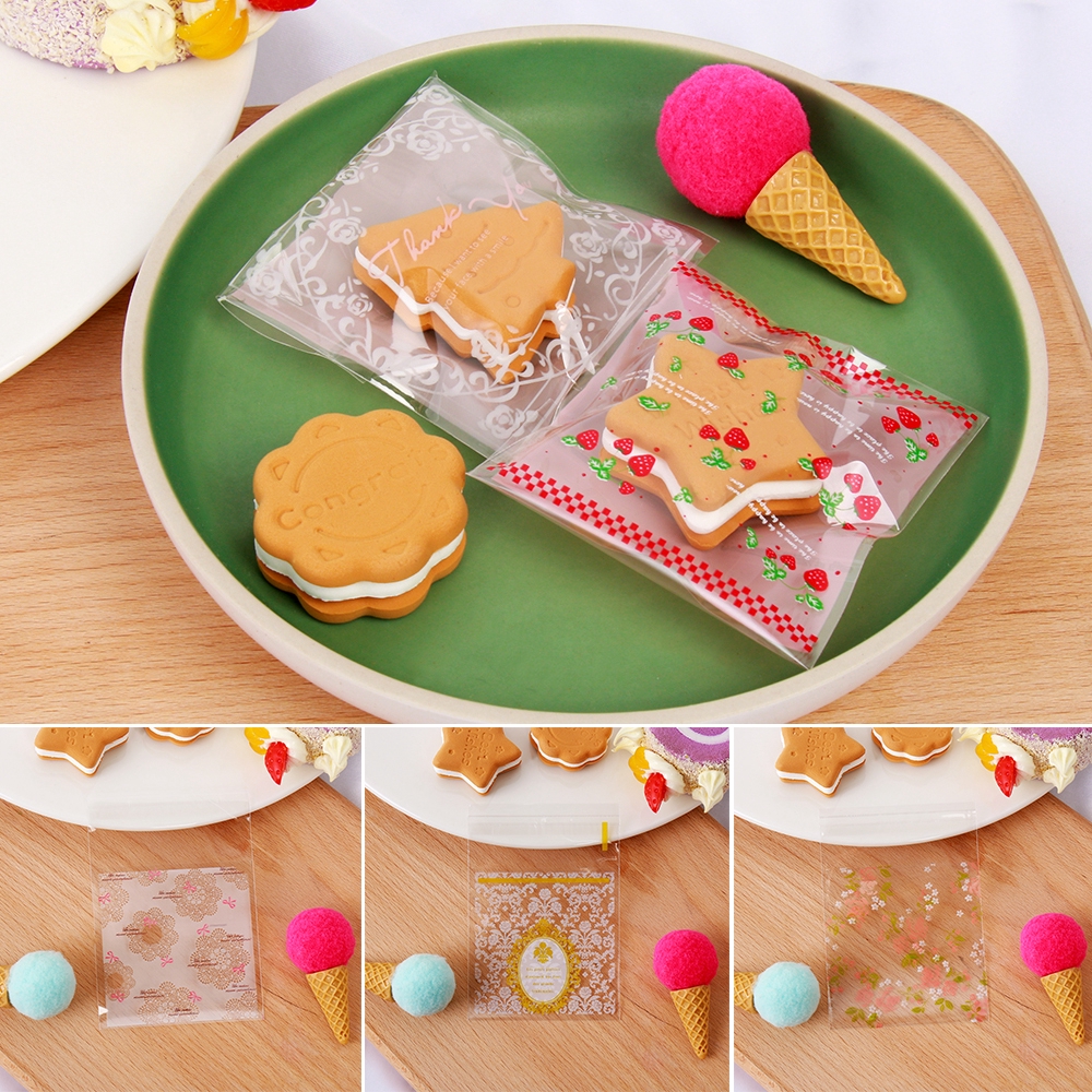 Set 100 túi nhựa dán đựng kẹo in hoa xinh xắn