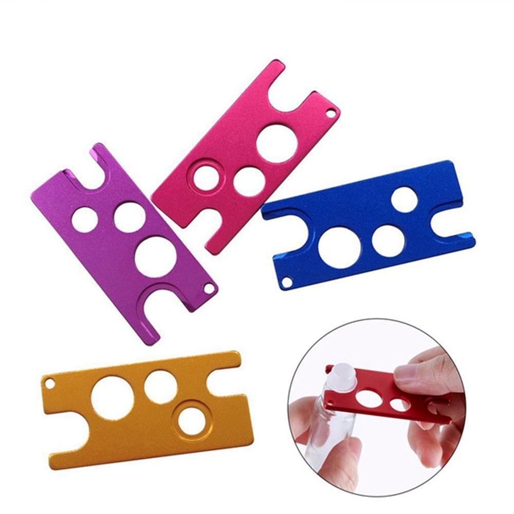 Dụng Cụ Mở Nắp Chai Tinh Dầu Kiêm Móc Khóa Bằng Kim Loại