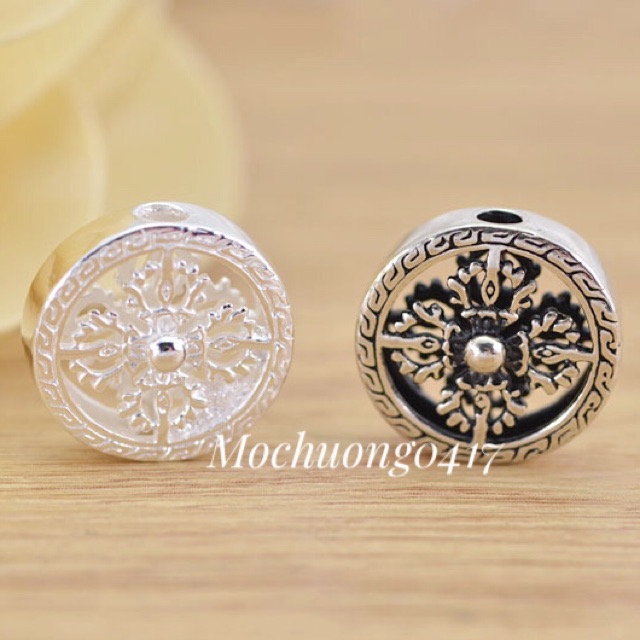 Charm bạc thái bánh xe pháp luân