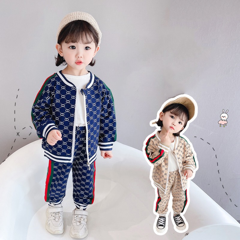 Set đồ 2 món áo khoác khóa kéo in họa tiết kèm quần dài thời trang cho bé