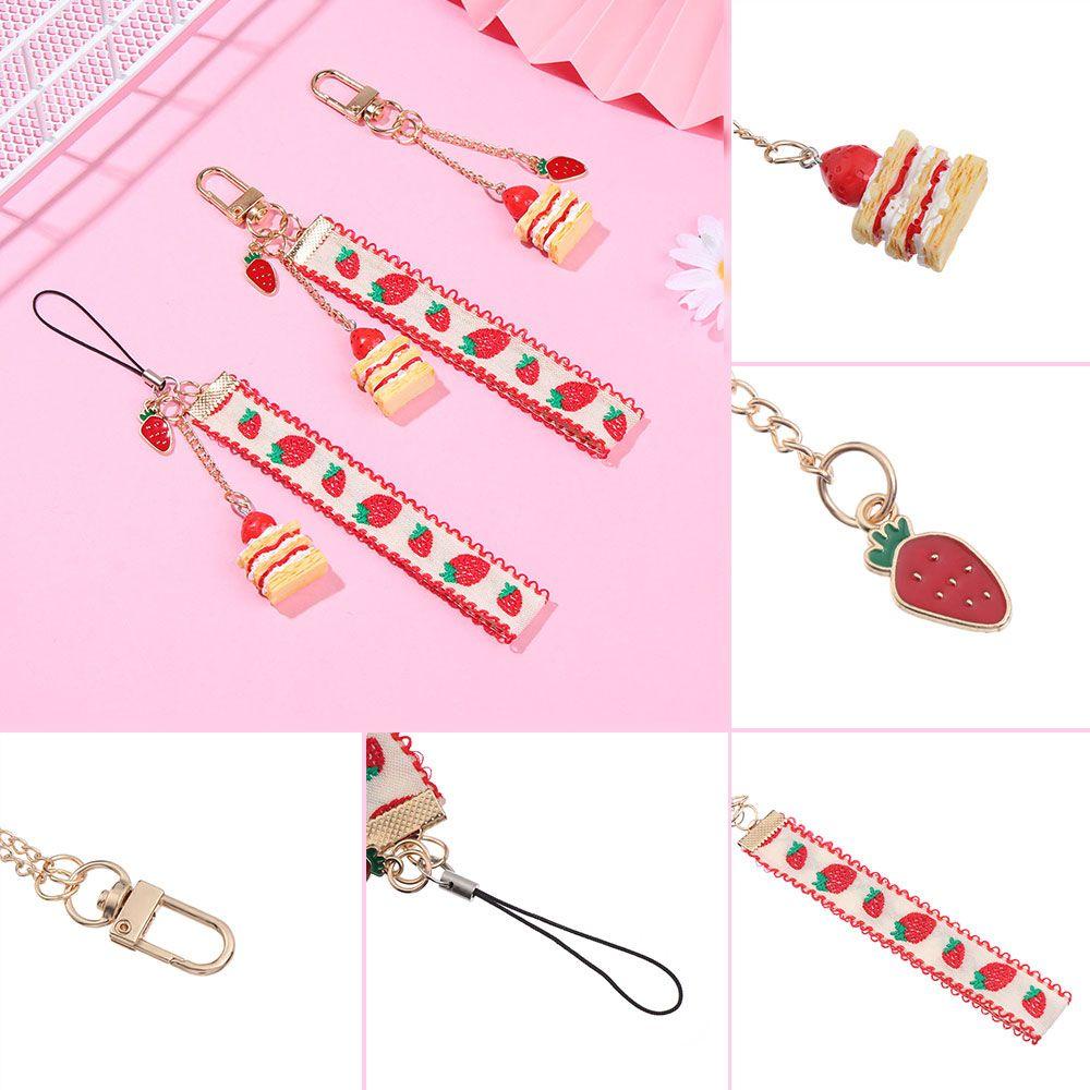 Dây treo điện thoại mặt hình dâu đáng yêu thời trang cho nữ