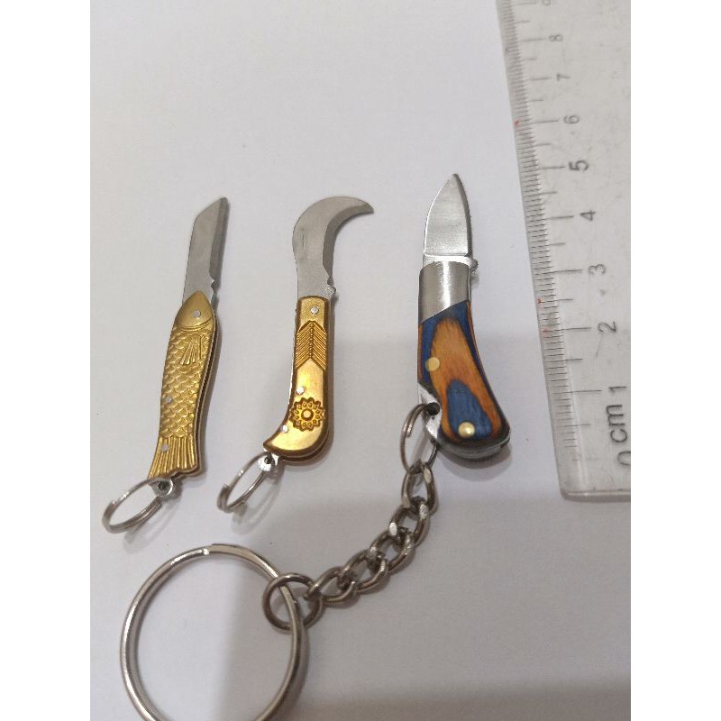 Dao gấp mini edc dùng khui thùng