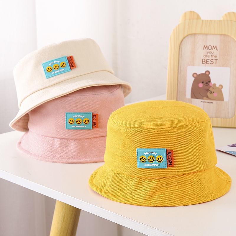 Mũ bucket da họa tiết mặt cười dễ thương cho bé
