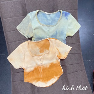 Áo kiểu loang nút bấm vạt bầu