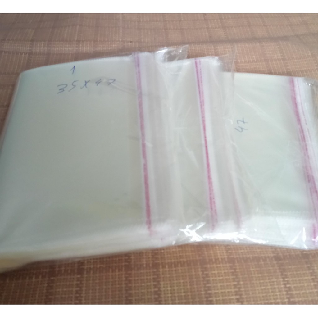 Nửa kg túi bọc ni lông bóng kiếng OPP dán miệng trong suốt có keo