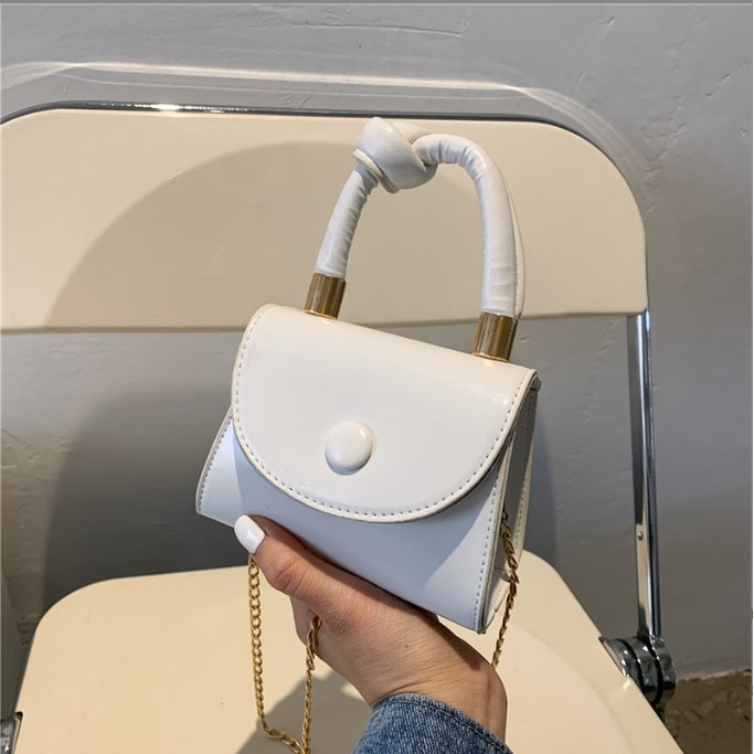 Túi xách nữ mini đựng son phấn tay xách thắt nút kiểu dáng lạ Capucha T131