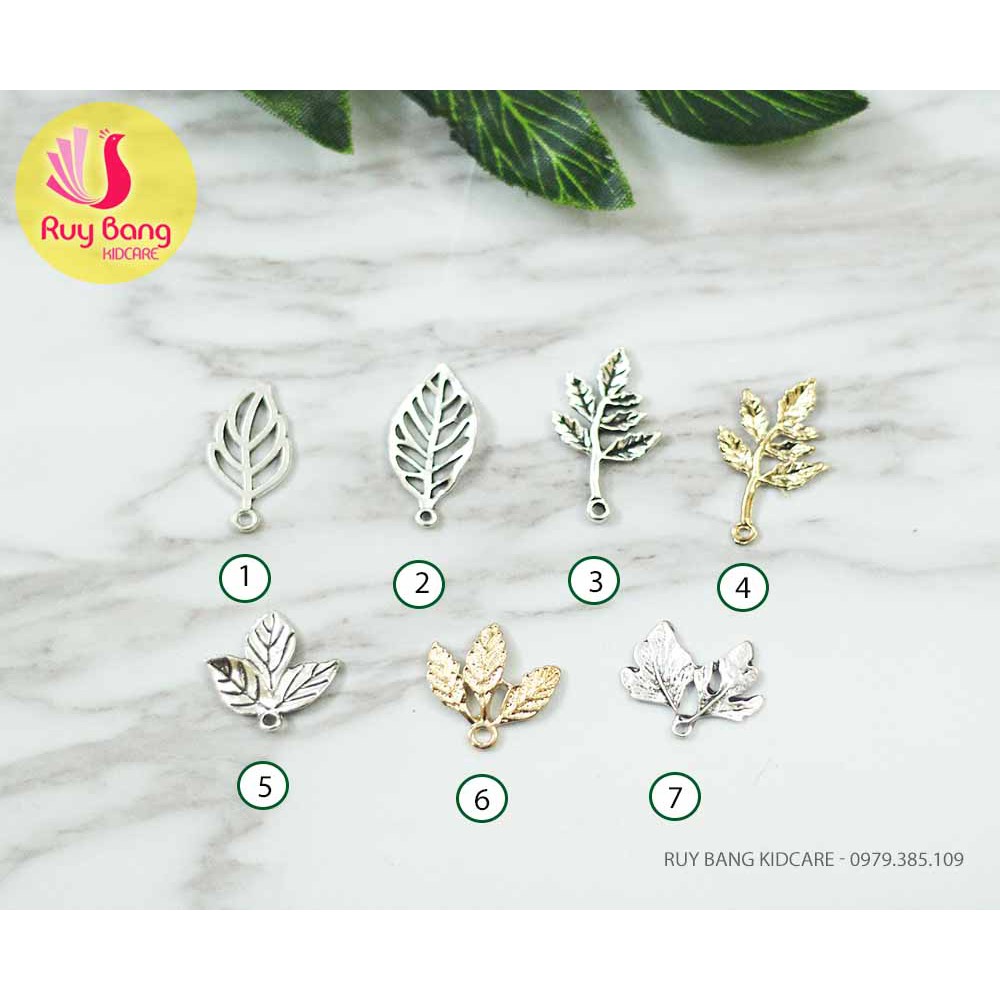 Cành lá kim loại, center đá đính hoa vải handmade