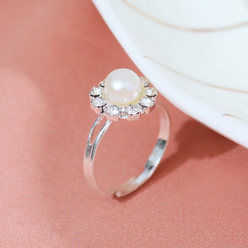 Nhẫn Hình Hoa Hướng Dương Đính Ngọc Trai Phong Cách Hàn Quốc