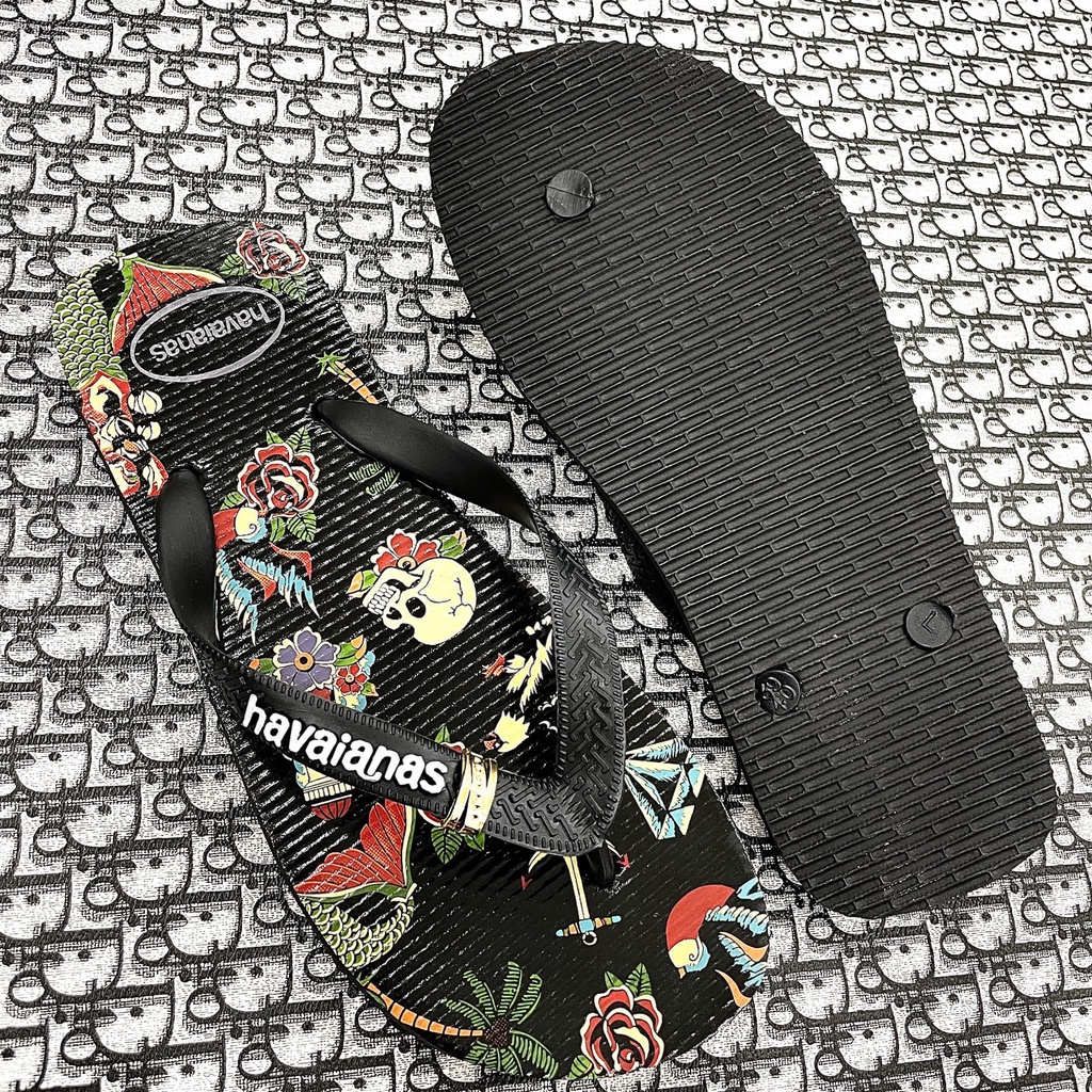 Dép xỏ ngón nam Havanas hoạ tiết đầu lâu in 3D, phù hợp đi biển bền bỉ êm chân thời trang cá tính.