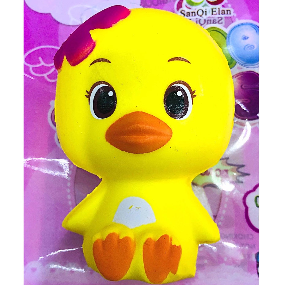 Squishy Lớn JUMBO Hình vịt con màu vàng đeo châm cài tóc tím Đồ Chơi Xốp Giảm Stress Hình mềm mịn dễ Thương đàn hồi