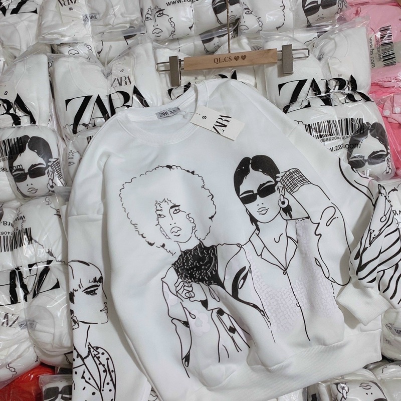 Áo nỉ cô gái form rộng tay bồng