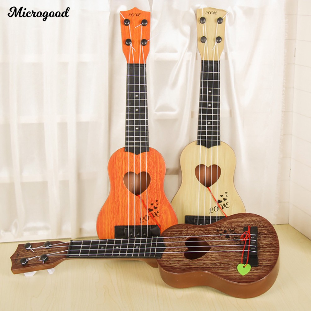 Đàn guitar đồ chơi 4 dây giáo dục cho trẻ em độc đáo