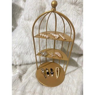 kệ lồng chim đựng mỹ phẩm