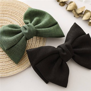 Kẹp tóc nơ vintage đón giáng sinh