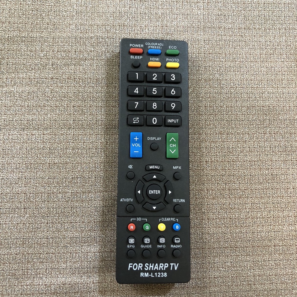 Điều khiển tivi SHARP TV RM-L1238 đa năng - Dùng được cho các tivi sharp hiện nay - Tặng kèm pin và bảo hành 3 tháng