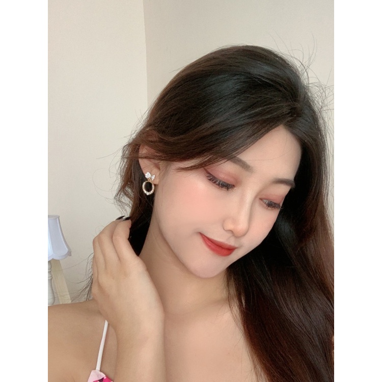 Hoa tai nơ hình tròn nữ tính