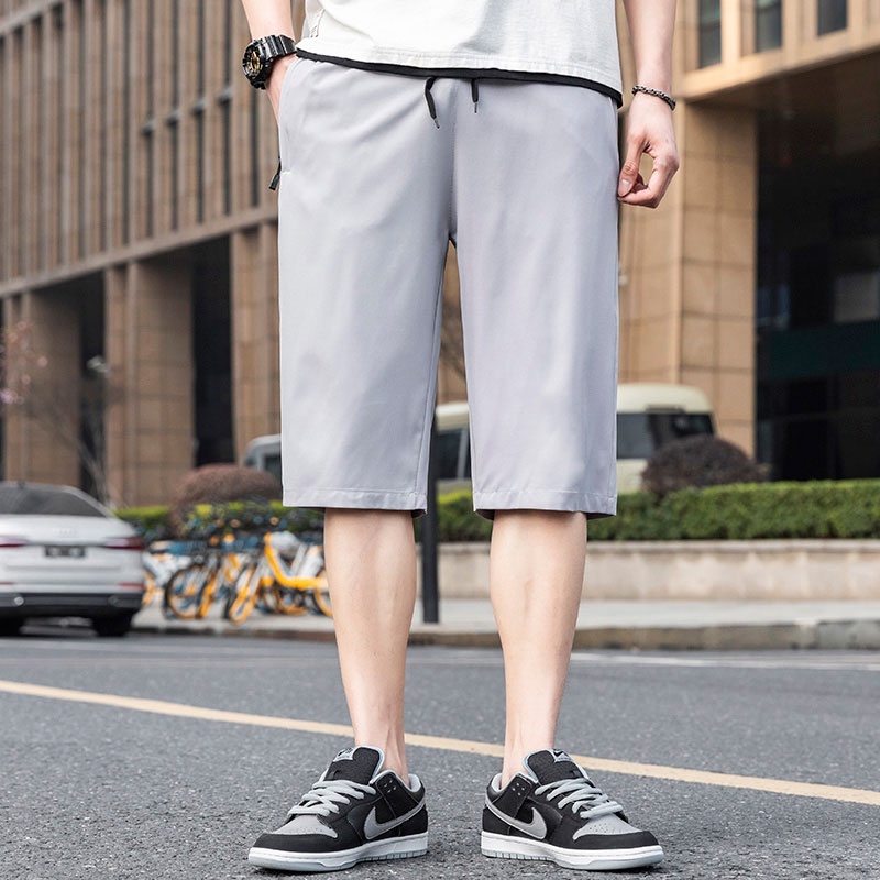 Quần Short Thể Thao Ống Rộng Màu Sắc Trơn Nhanh Khô Có Túi Khóa Kéo Thời Trang Mùa Hè Dành Cho Nam