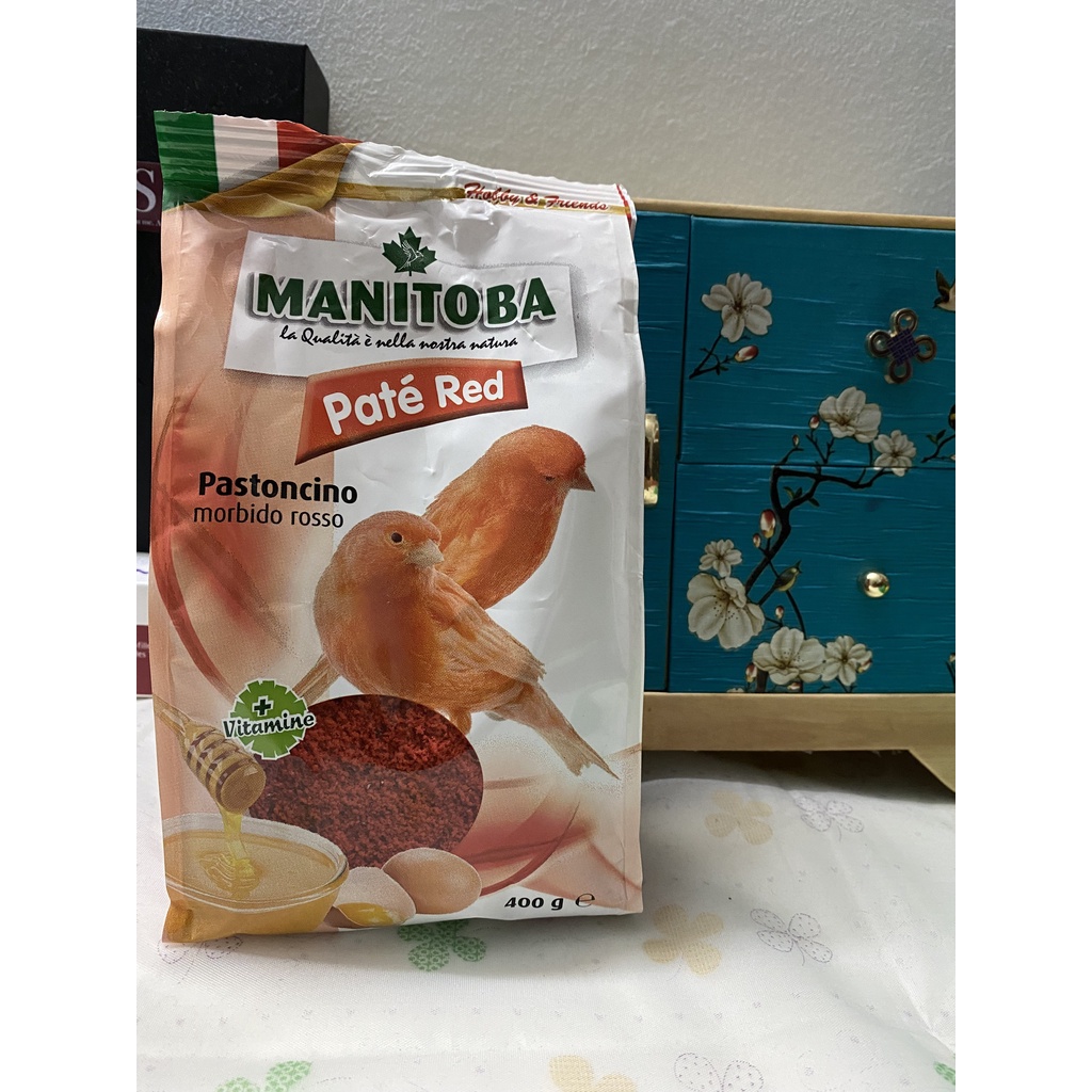 Combo 1kg hạt trộn cho yến hót Manitoba + 1 gói pate đỏ