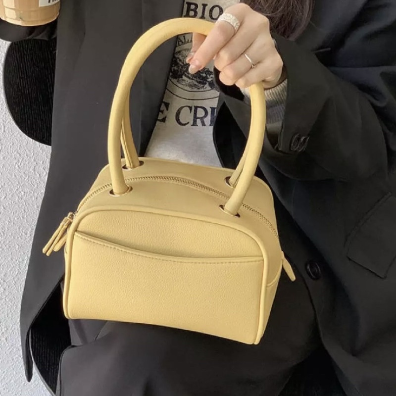 Túi xách cầm tay hot trend taobao màu vàng không kèm dây đeo