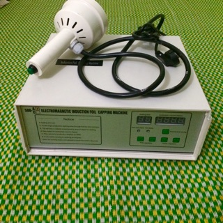 Máy dán màng seal chai lọ 500A -500C