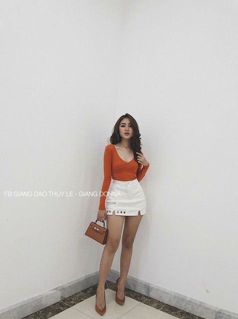 Chân váy ngắn phối khoen cá tính có quần trong