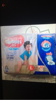 Bỉm dán huggies đệm mây size M76,L68