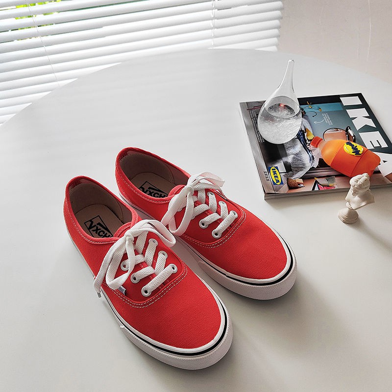 Giày vải canvas đế trắng thời trang đường phố cho nữ 2021
