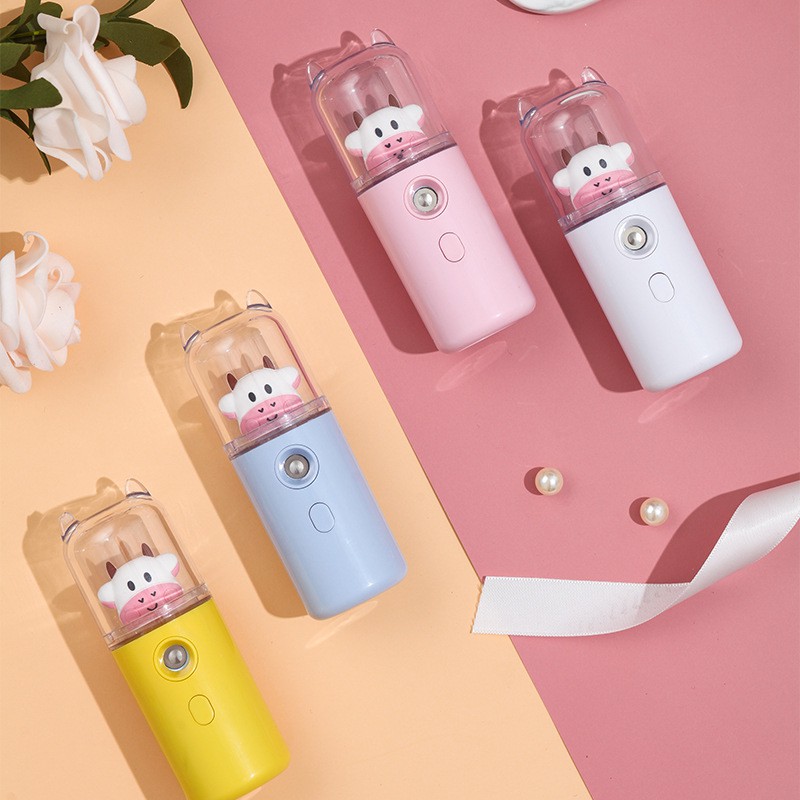 Máy phun sương mini cầm tay xông hơi tạo độ ẩm cho da, máy cấp ẩm mặt nano họa tiết bò sữa URI DECOR