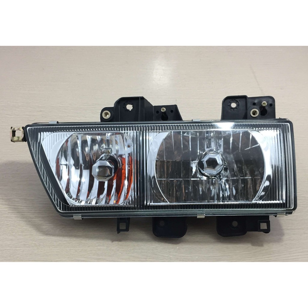 Đèn pha xe tải  lắp cho xe thùng JAC, Chiến Thắng 2,5 tấn, xe ben 5 tấn. Mặt thủy tinh, xi nhan rời