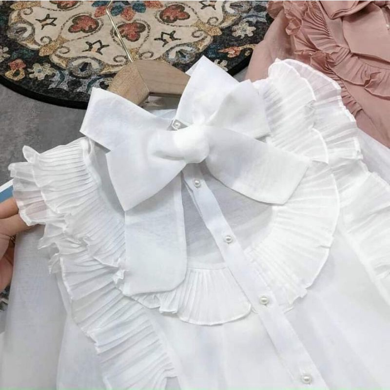 áo cổ nơ nhà e mới về ạ . vải von đáng yêu cực kỳ nhẹ cả nhà . áo tiểu thư rất xinh