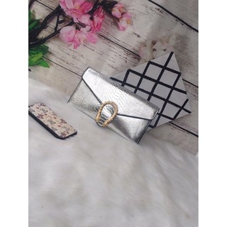Ví clutch đầu rồng
