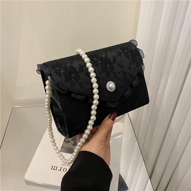 Túi xách đeo chéo nữ phong cách tiểu thư đính ngọc nhân tạo màu đen trắng