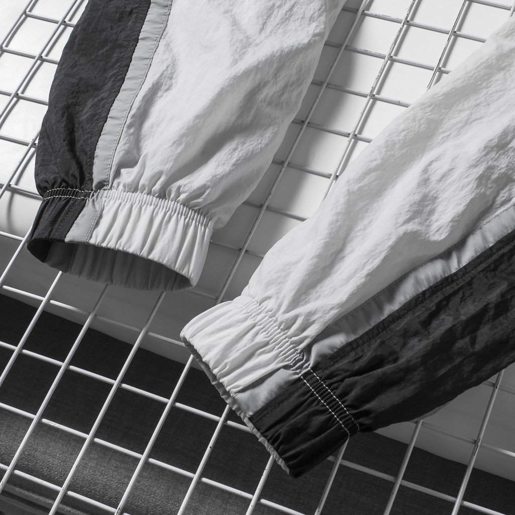 QUẦN DÀI THỂ THAO NIKE SEASONAL WOVEN PANT - TRẮNG / ĐEN / XÁM