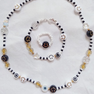 Set vòng hạt cườm đen trắng phối charm Lilian