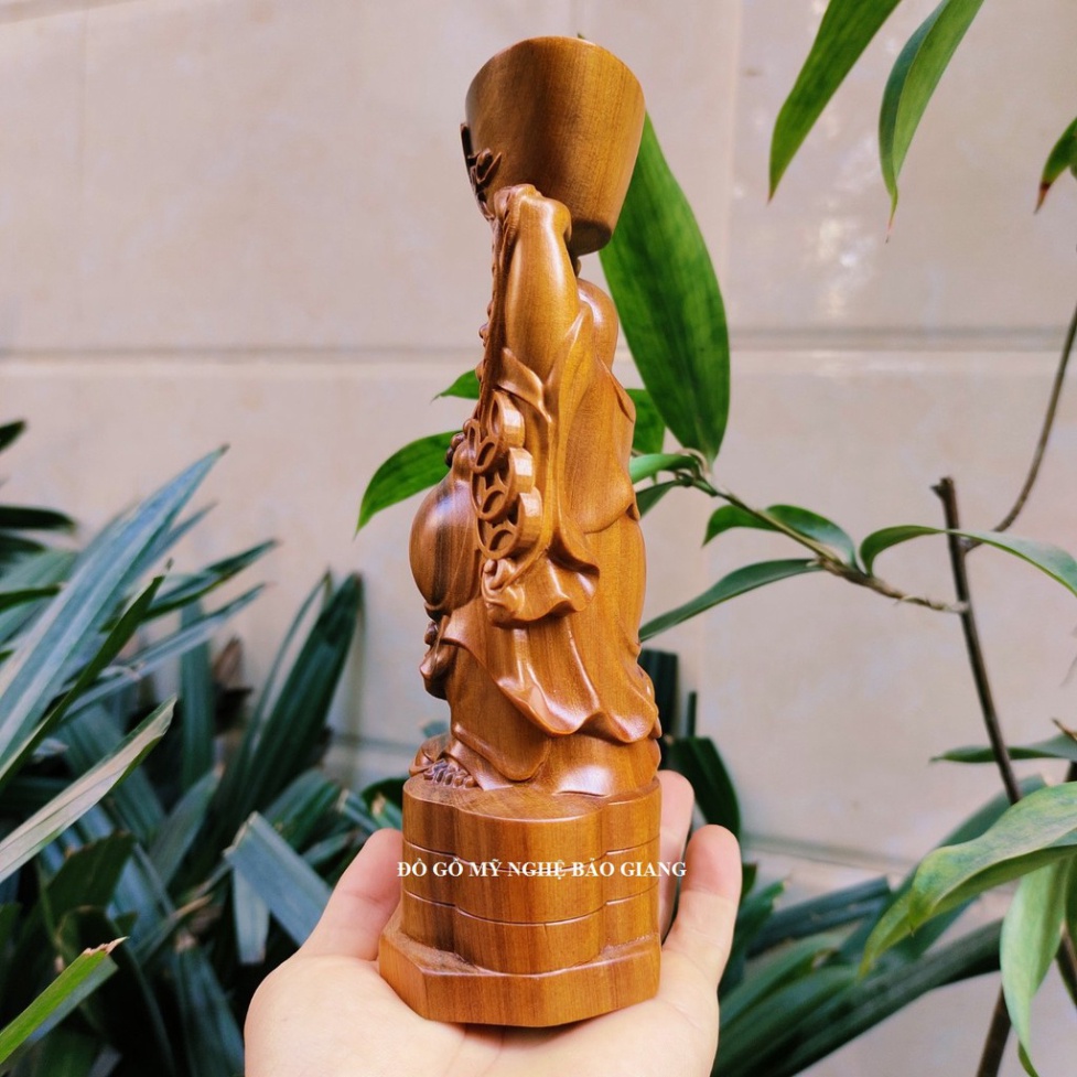 Tượng phật di lặc dâng vàng bằng gỗ