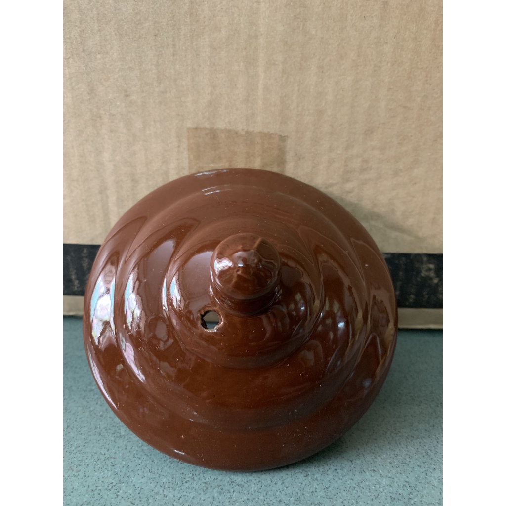 Nắp ấm của ấm sắc thuốc