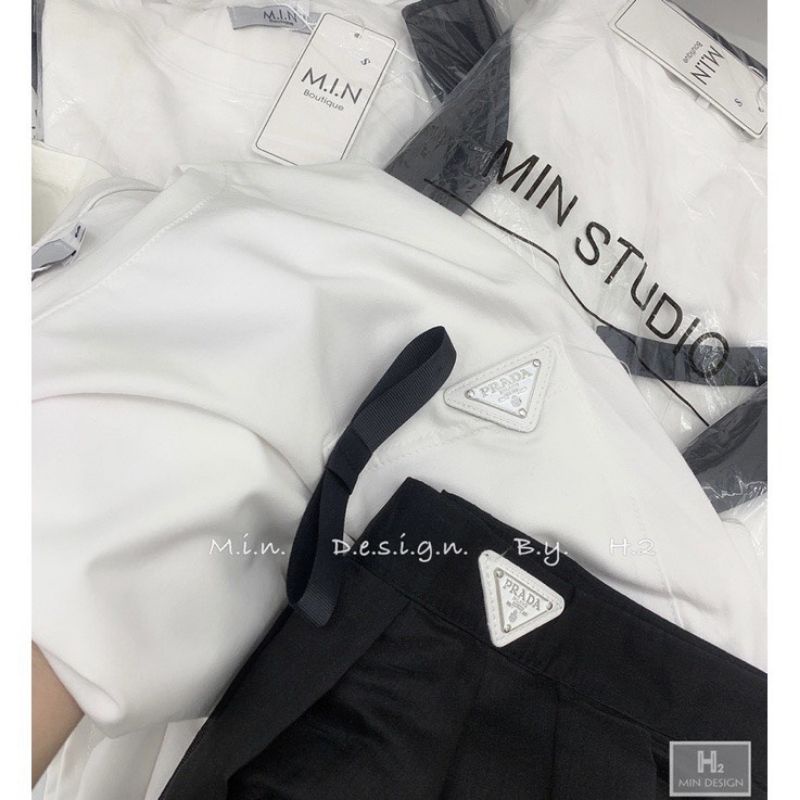 Set váy Áo phông trắng phối chân váy dài dáng xoè dễ thương.