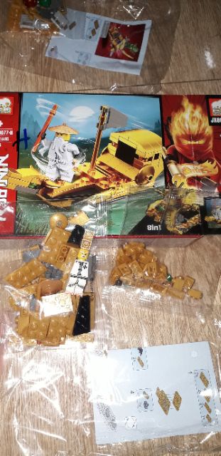Lắp ráp 1 hộp LegoNinjag Rồng Vàng JX80077 có nhiều chi tiết bằng nhựa ABS