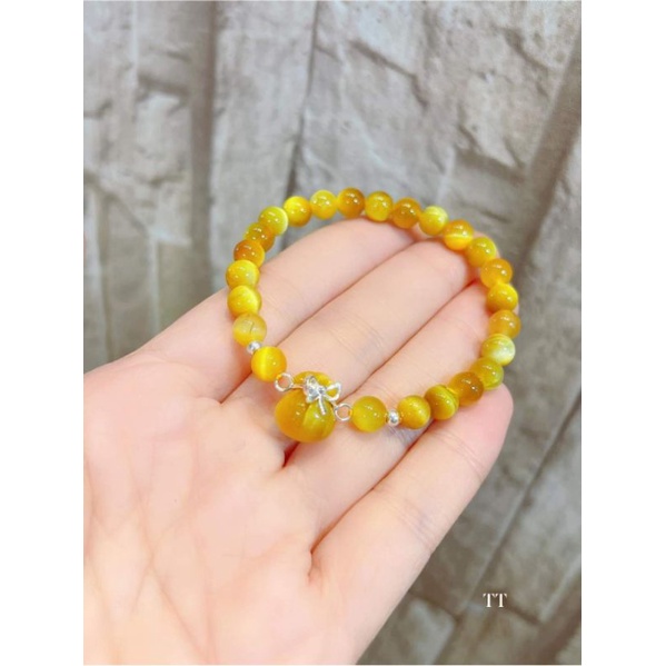 Kẹp nơ móc túi tiền bạc ta làm vòng tay