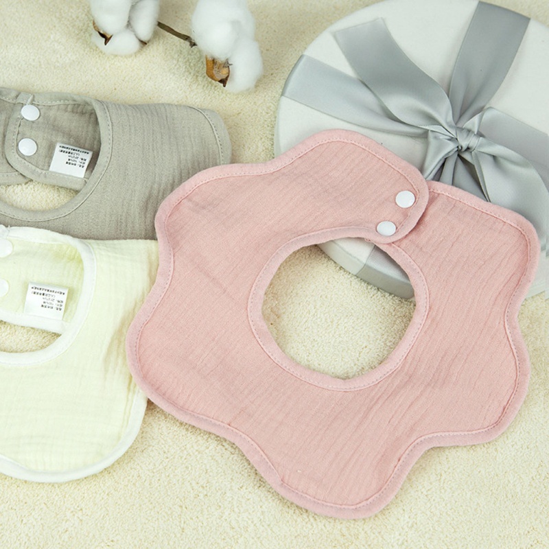 Yếm đeo cổ vải cotton màu trơn hình hoa xoay 360 độ thoáng khí tiện dụng cho bé