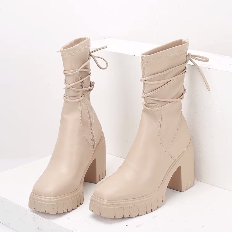 Boots da mềm cổ lửng buộc dây . xuất uk