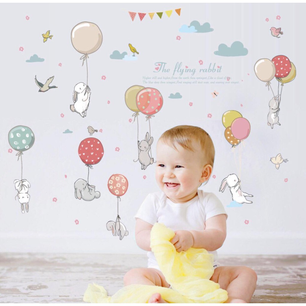 decal dán tường thỏ ôm bóng