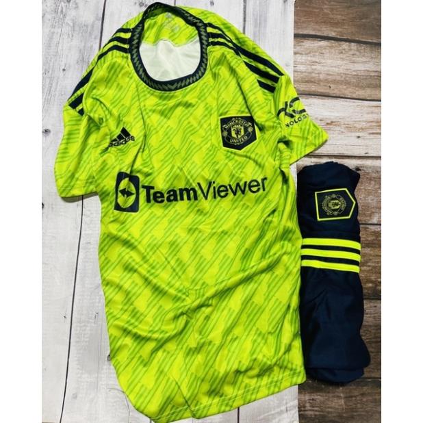 Set bộ quần áo thể thao bóng đá nam nữ vải gai mịn clb mu manchester united áo xanh chuối quần đen logo thêu 2022 2023