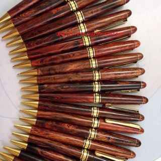 Bút gỗ sưa đỏ gôc huyết long