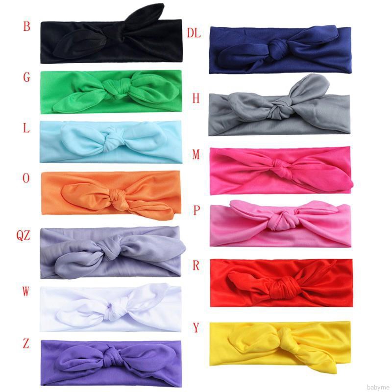 Băng đô nơ màu trơn dễ thương cho bé