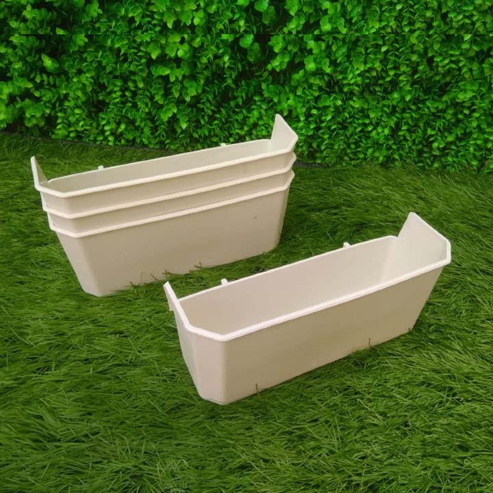 Máng ăn chống vãi cho chim Bồ câu