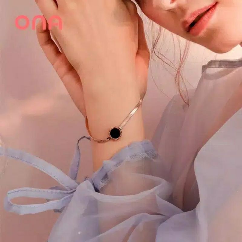Vòng Tay Xương Rắn Đen Bằng Titan Chống Rỉ Sét