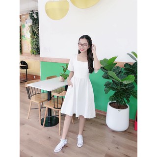 Đầm xoè cánh tên đan lưng